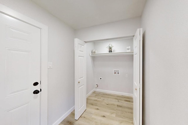 laundry room featuring baseboards, laundry area, electric dryer hookup, washer hookup, and light wood-style floors