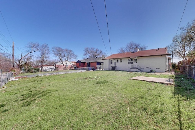 view of yard featuring a fenced backyard