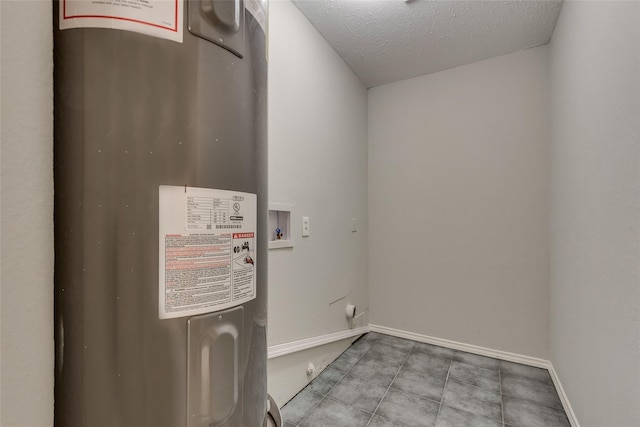 utility room featuring electric water heater