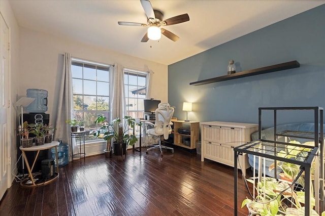 interior space featuring hardwood / wood-style floors and a ceiling fan