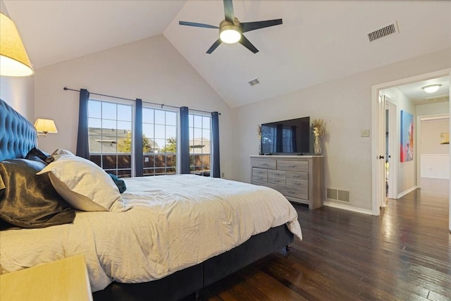 bedroom with wood finished floors, visible vents, and baseboards