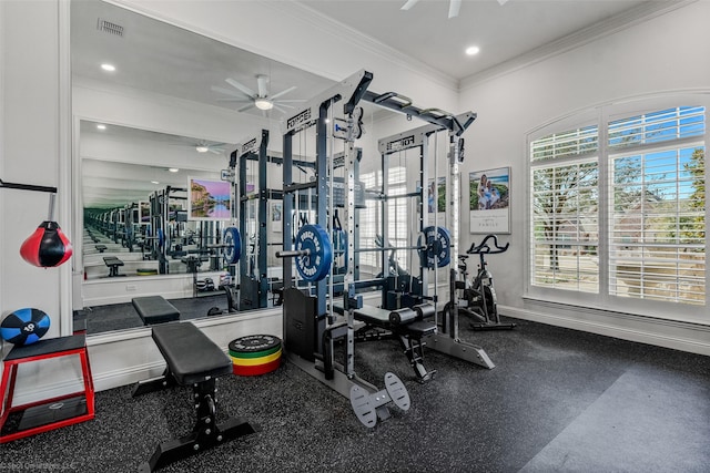 workout area with visible vents, a healthy amount of sunlight, a ceiling fan, and ornamental molding