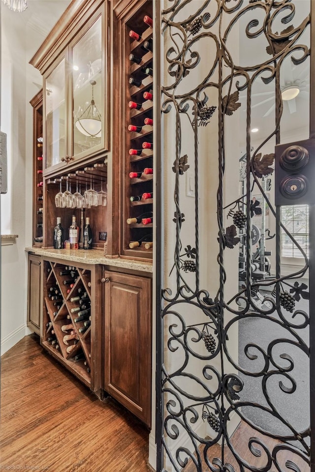 wine cellar featuring wood finished floors