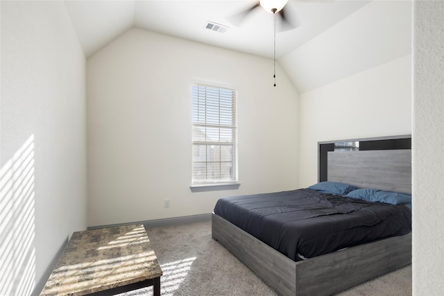 carpeted bedroom featuring visible vents, a ceiling fan, and lofted ceiling