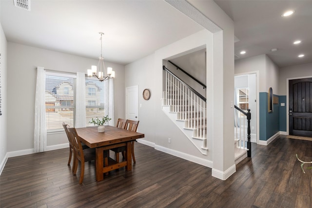 dining room with baseboards, visible vents, and dark wood-style flooring