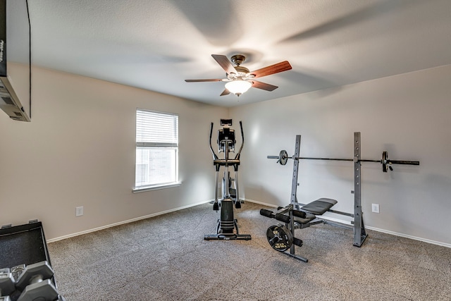 workout room with carpet, baseboards, and ceiling fan