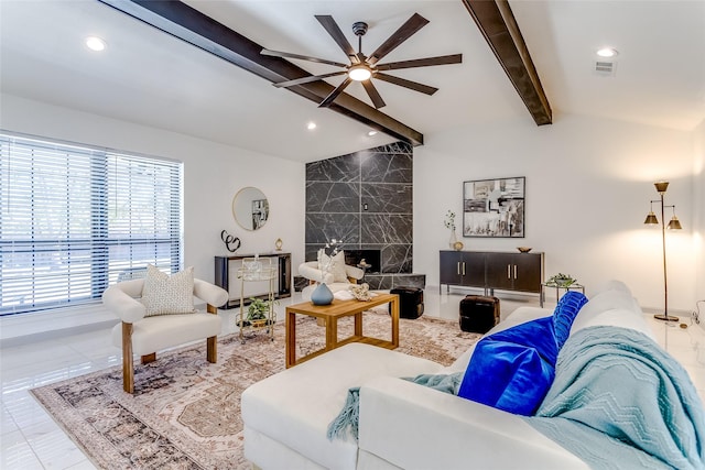 living area featuring lofted ceiling with beams, visible vents, ceiling fan, and recessed lighting