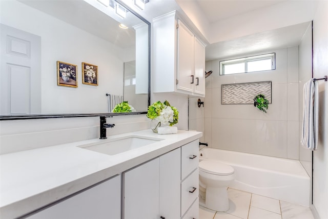 full bath with tile patterned floors, toilet, vanity, and shower / bath combination