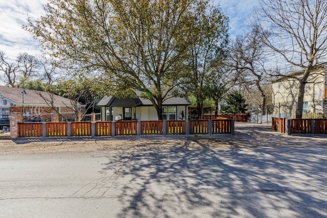 view of front of house with fence