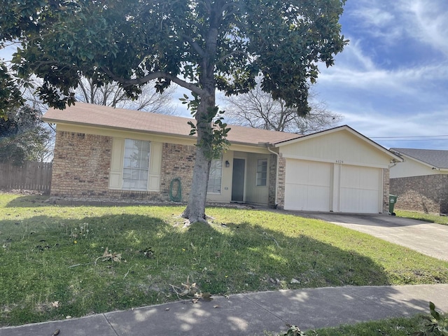 single story home with brick siding, a front lawn, fence, concrete driveway, and an attached garage