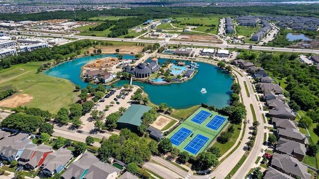 bird's eye view with a water view and a residential view