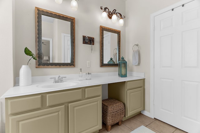 bathroom with vanity and tile patterned flooring