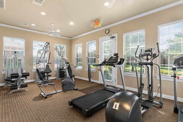 exercise room featuring crown molding, visible vents, and ceiling fan