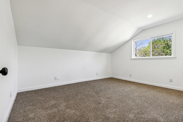 bonus room featuring recessed lighting, baseboards, carpet flooring, and vaulted ceiling