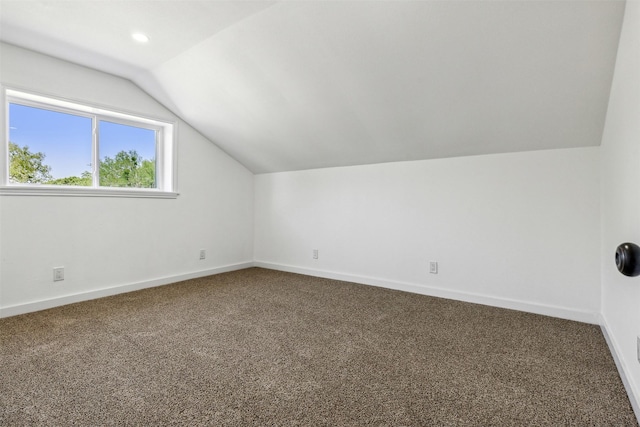 bonus room with carpet flooring, recessed lighting, baseboards, and vaulted ceiling