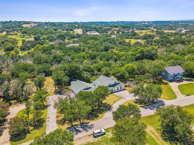 aerial view with a wooded view