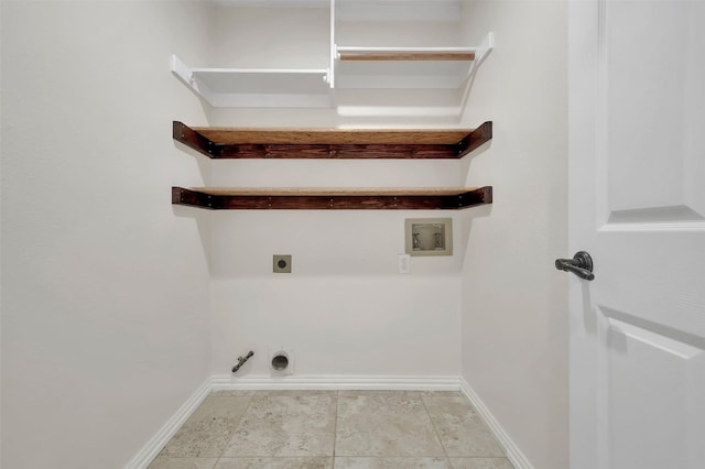 washroom featuring baseboards, gas dryer hookup, washer hookup, laundry area, and electric dryer hookup