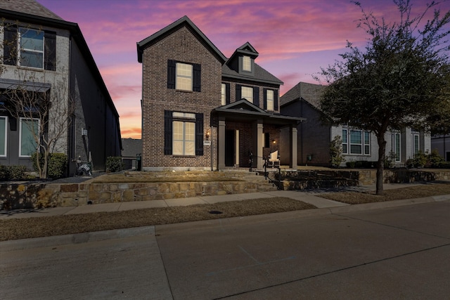 view of front of property with brick siding