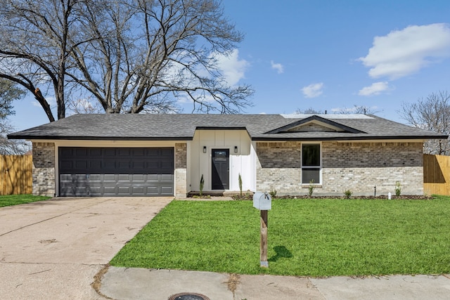 view of front of house featuring brick siding, concrete driveway, a front lawn, and fence