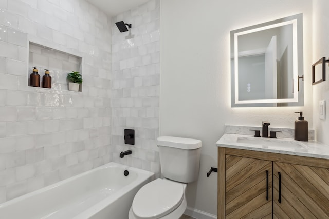 bathroom with toilet, bathtub / shower combination, and vanity