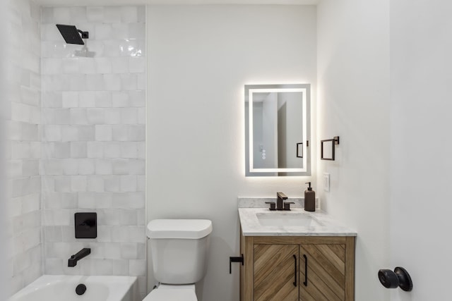 full bath featuring toilet, vanity, and shower / bathtub combination