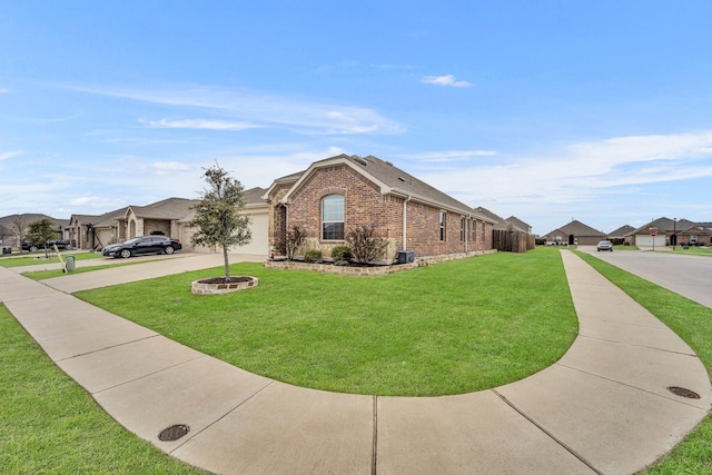 view of property exterior featuring driveway, a lawn, an attached garage, and brick siding