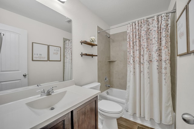 full bath with vanity, shower / bath combination with curtain, toilet, and wood finished floors