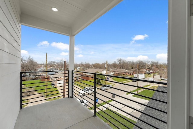 balcony featuring a residential view