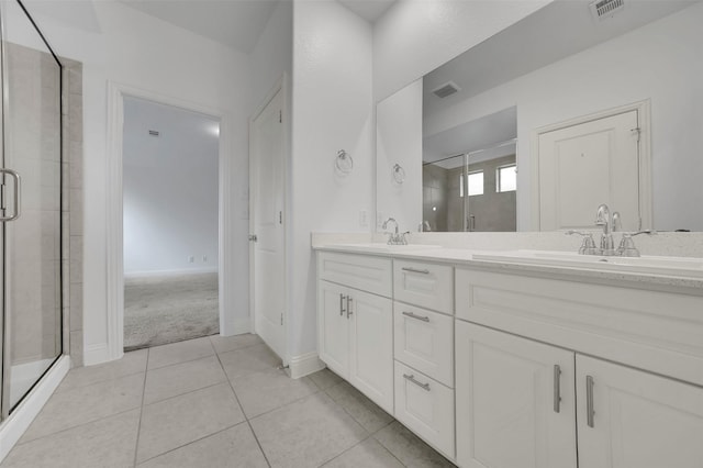 full bathroom with a shower stall, visible vents, and a sink