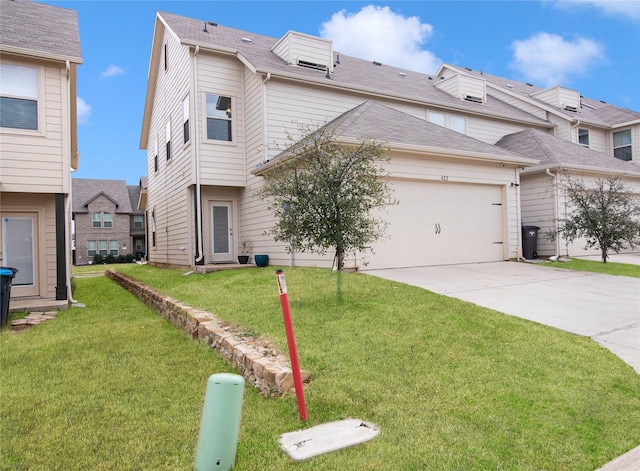 view of front facade with a garage, concrete driveway, and a front yard