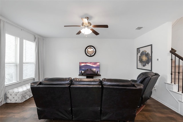 living room featuring visible vents, a ceiling fan, dark wood-style floors, stairway, and baseboards