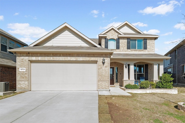 craftsman-style home with central air condition unit, driveway, covered porch, an attached garage, and brick siding