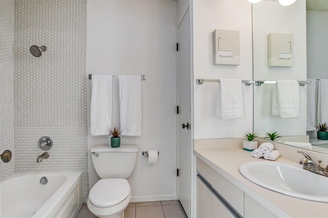 bathroom with toilet, shower / bathing tub combination, tile patterned flooring, baseboards, and vanity