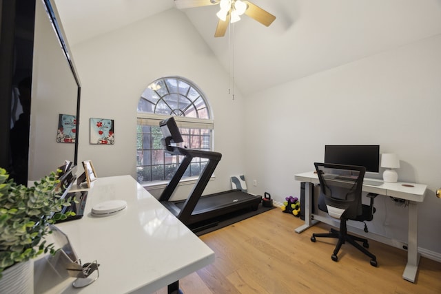 office space featuring high vaulted ceiling, wood finished floors, baseboards, and ceiling fan