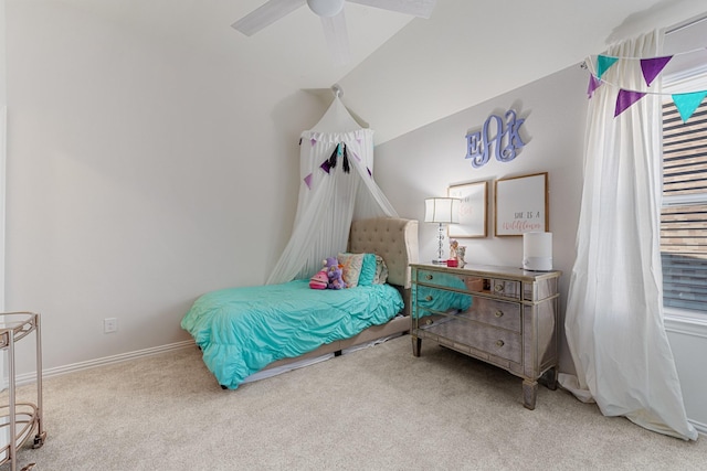 carpeted bedroom featuring baseboards and ceiling fan