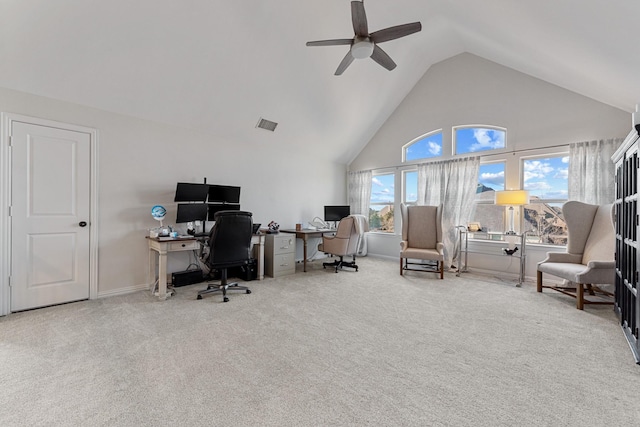 office space with visible vents, high vaulted ceiling, carpet flooring, baseboards, and ceiling fan