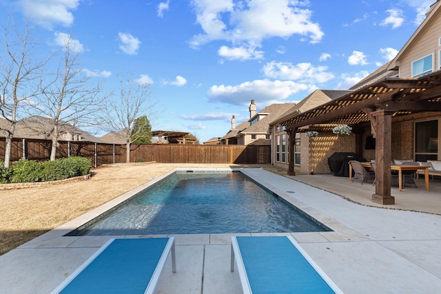 view of pool featuring a patio area, a fenced in pool, a fenced backyard, and a pergola