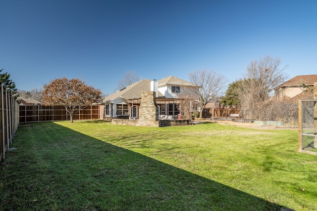 view of yard with a patio and a fenced backyard