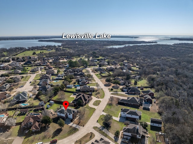 aerial view with a residential view and a water view