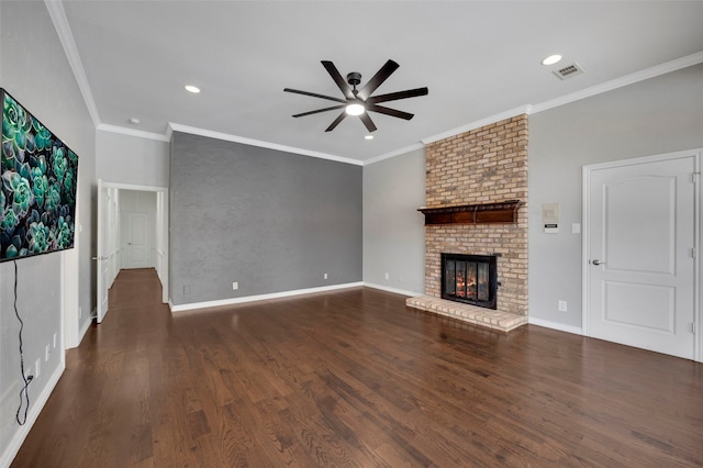 unfurnished living room with ornamental molding, wood finished floors, visible vents, and ceiling fan