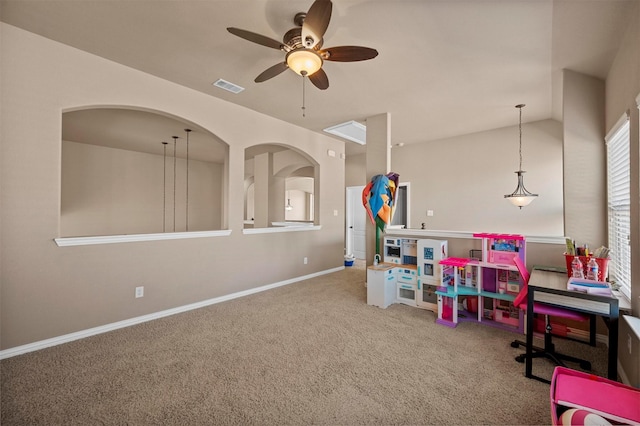 rec room with visible vents, baseboards, ceiling fan, and carpet flooring