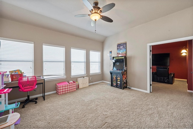 recreation room featuring ceiling fan, baseboards, lofted ceiling, and carpet