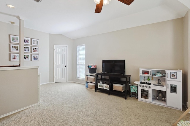 interior space with a ceiling fan, baseboards, carpet floors, lofted ceiling, and recessed lighting