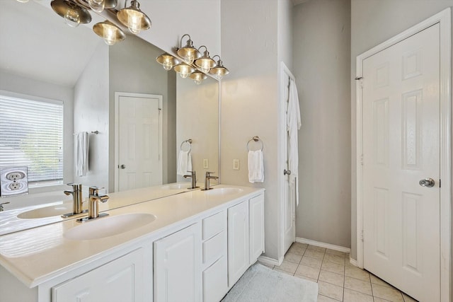 full bathroom featuring a sink and tile patterned floors