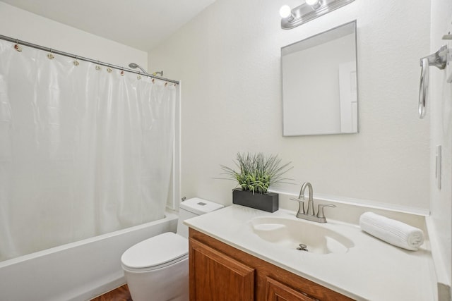 full bathroom with toilet, shower / bath combo, and vanity