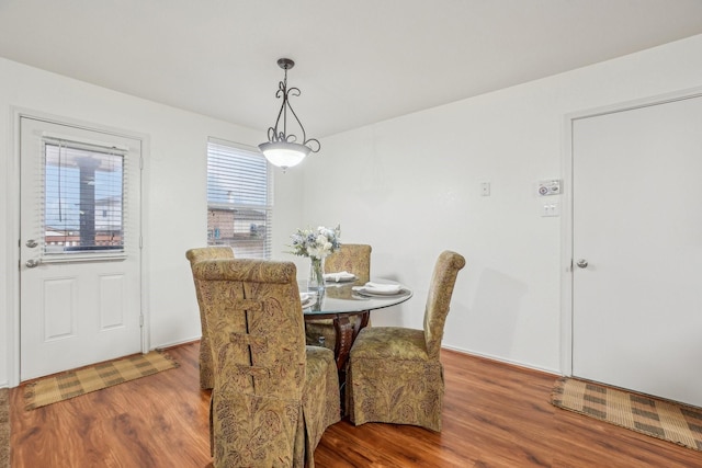 dining area featuring wood finished floors