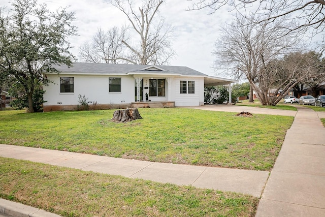 single story home featuring crawl space, driveway, a carport, and a front yard