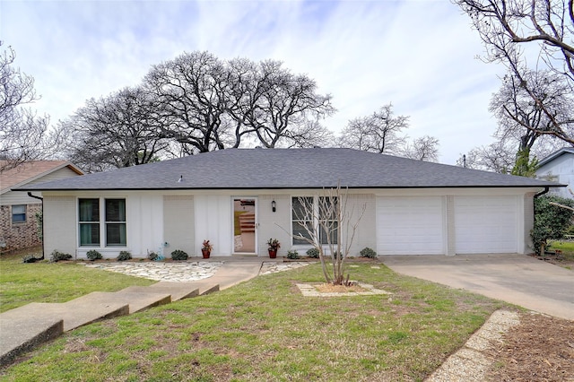 ranch-style home with brick siding, a shingled roof, a front lawn, a garage, and driveway