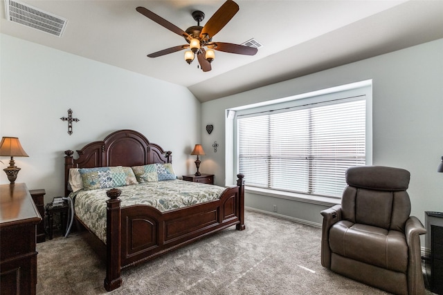 bedroom featuring visible vents, lofted ceiling, carpet, and baseboards