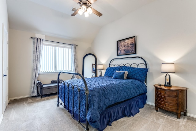 bedroom with visible vents, lofted ceiling, a ceiling fan, carpet floors, and baseboards